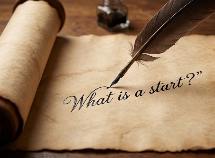 An open parchment scroll on a wooden surface with a quill pen writing the words "What is a start?".